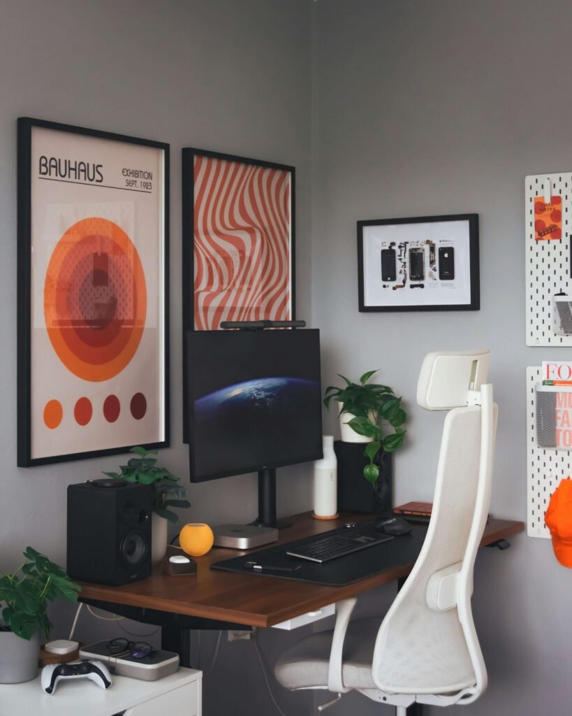 modern home office with desk and chair; orange aesthetic background