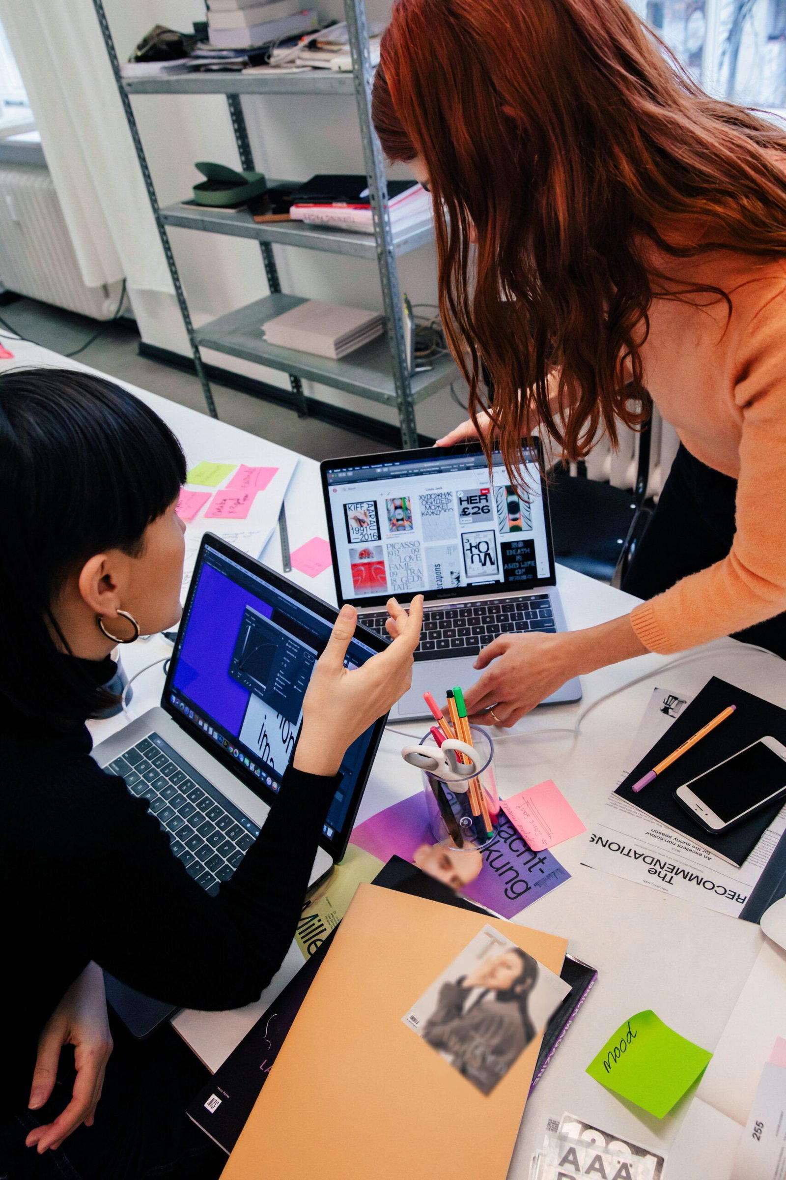 women working on project_laptop_workspace