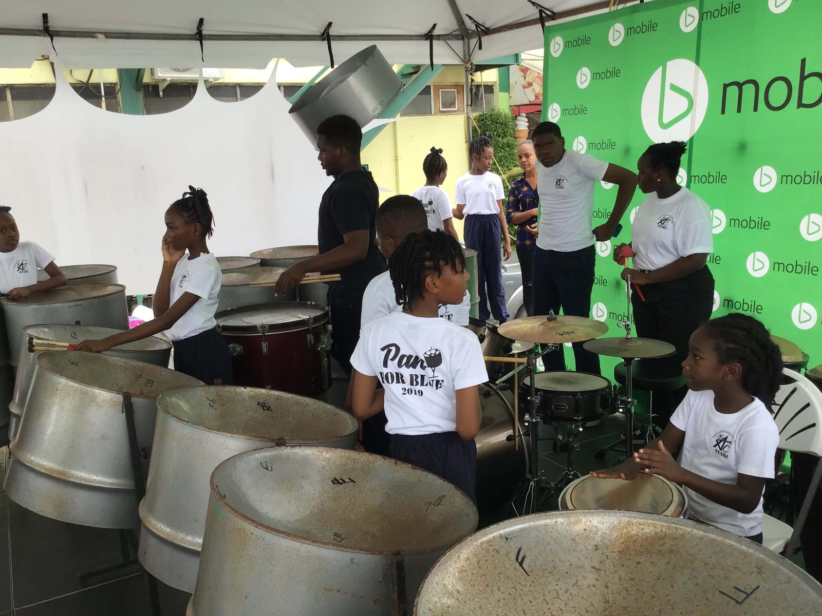 steelband players at pan for blue primary school players pre-event practice