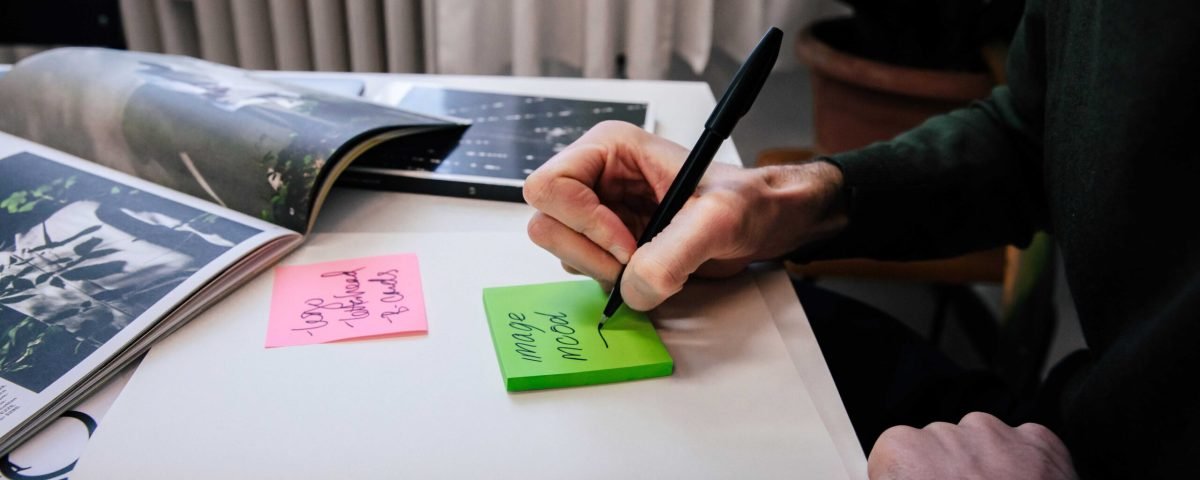 writing notes on sticky paper